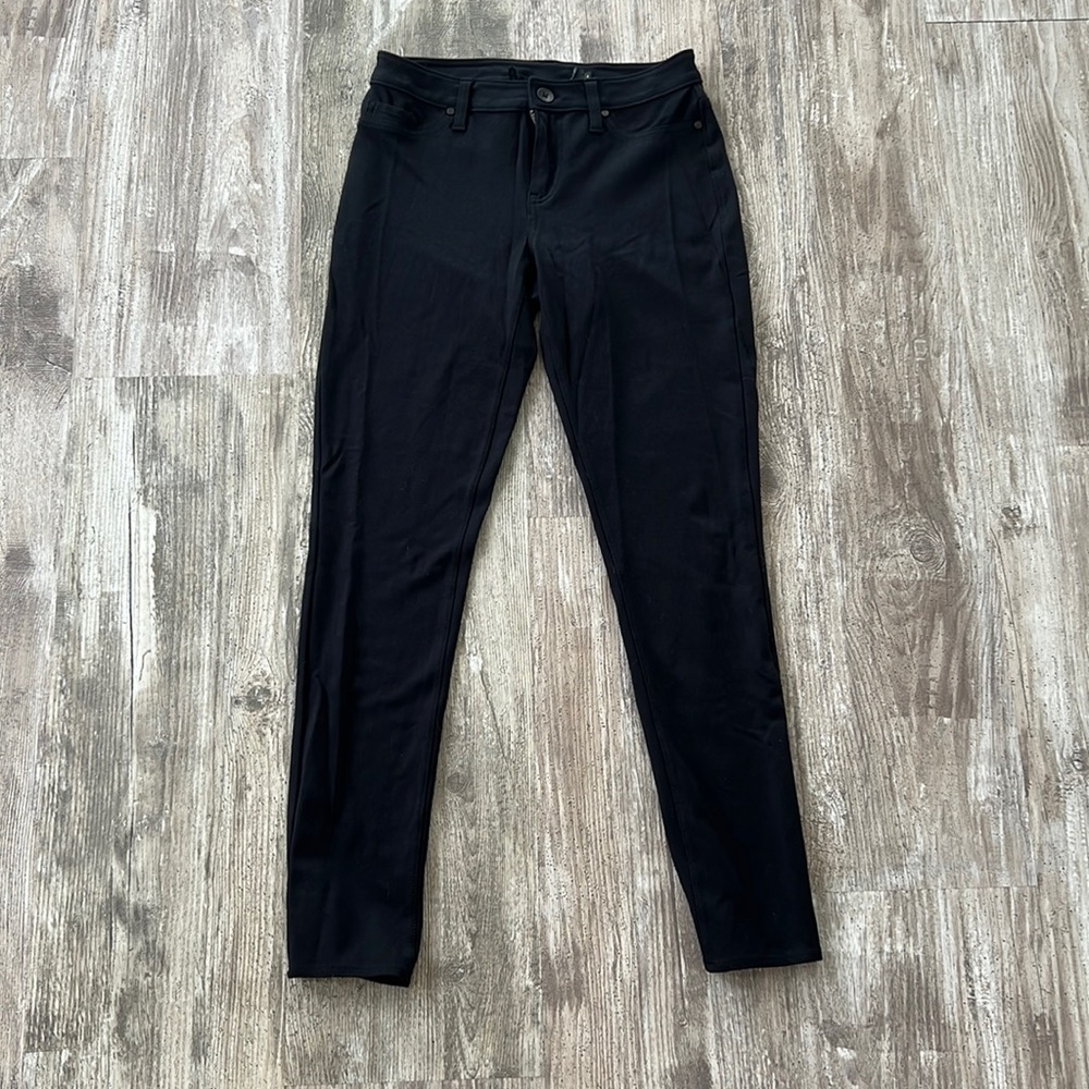 Calvin Klein, button up black jegging size 4 .. cut out tag for comfort